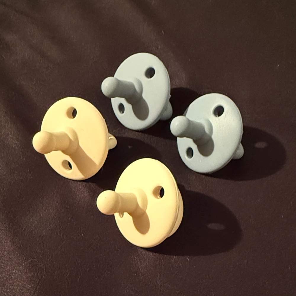 New AEIOU Pacifiers